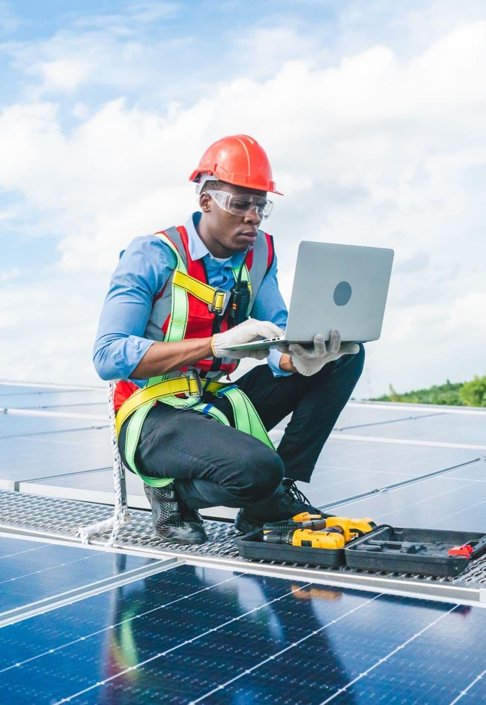 Lobcom engineer monitoring a solar installation on a laptop